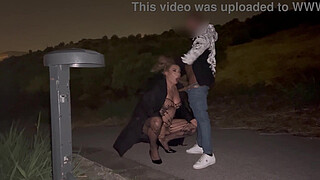 A PROSTITUTE OFFERING HERSELF ON THE STREET