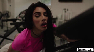 Bald guy cant stop starring at the ass of busty shemale while working out.After that,he licks her ass and barebacks it.